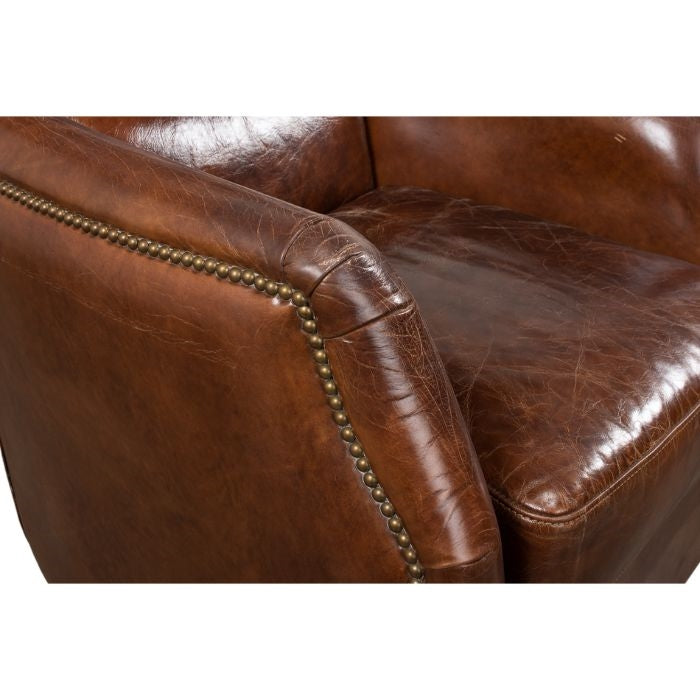 brown leather swivel armchair