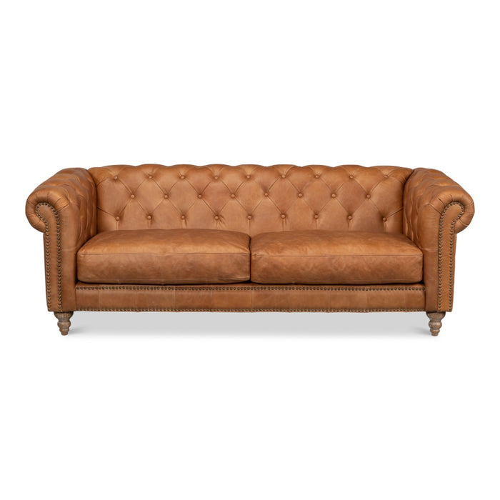 Tan leather studded couch