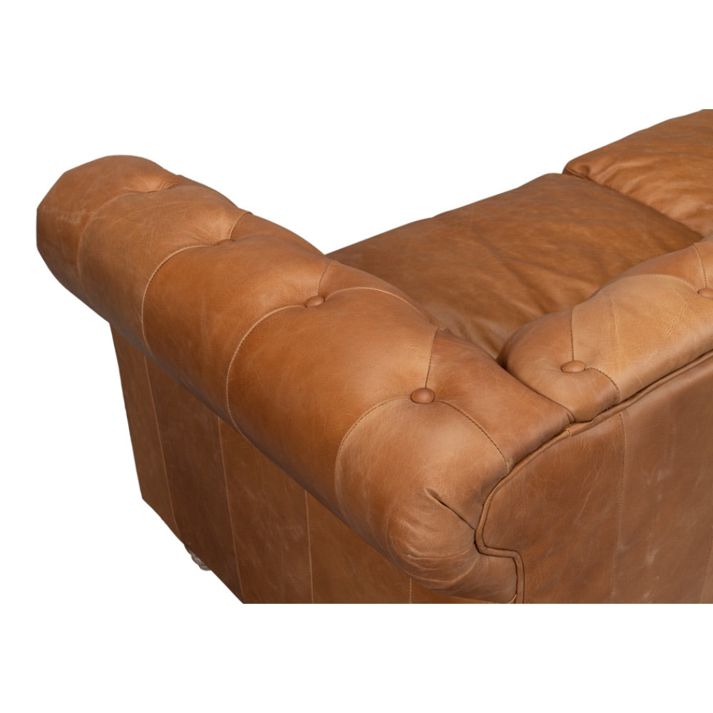 Tan leather studded couch
