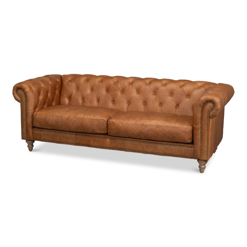 Tan leather studded couch
