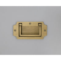 Unique grey dresser with gold accessories