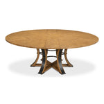 Large light tan round table with dark leather finishes