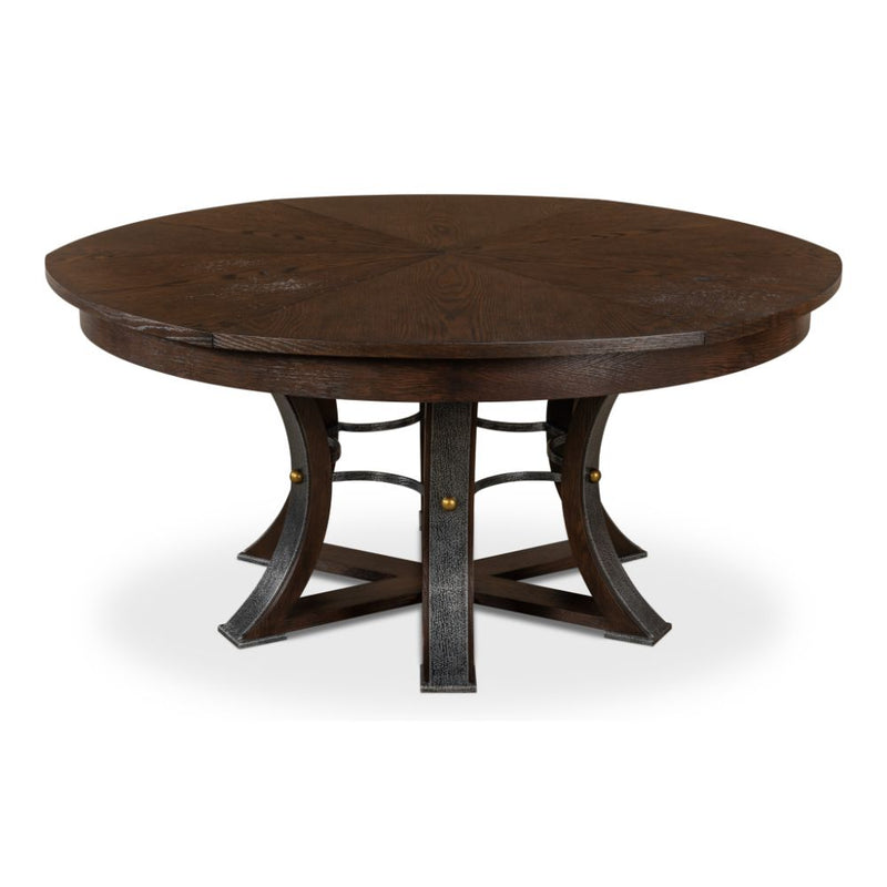 Large round dark wood table with gold studs