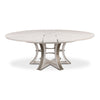Large round white wood table with metallic studs