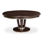 Classy dark wood round table with metallic finishes