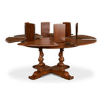 Sarreid, Ltd. round wood walnut stained dining table expandable adjustable four turned legs stored leaves