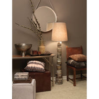 round white hide framed mirror with leather strap