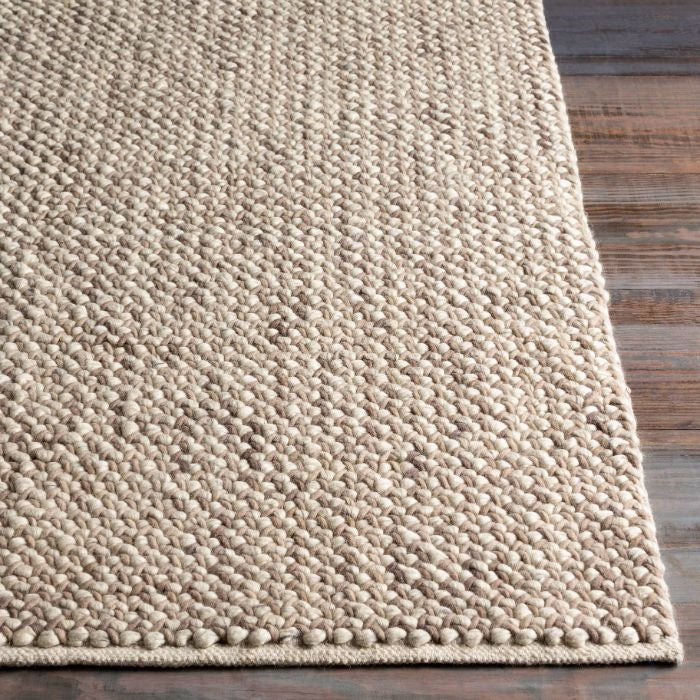 tan area rug no pile transitional