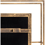 Close-up of the Surya Alpenglow Antique Gold Floor Mirror with a keyhole on the back.