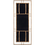 Surya's Alpenglow mirror features a geometric antique gold frame and black background.