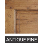 Close-up of wood with a rustic, dark stain finish and visible grain patterns labeled "Antique Pine." Ideal for infusing character into the custom-finished Warren Square Coffee Table by Phillips Scott.