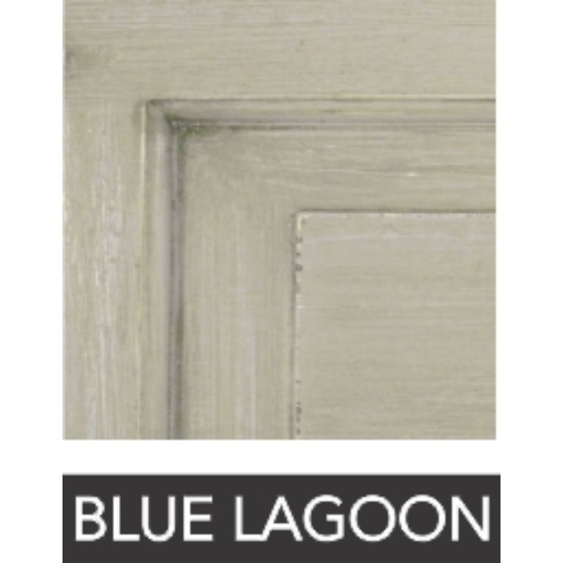 A close-up of a cabinet door corner with a weathered finish, labeled "BLUE LAGOON" underneath, showcasing the custom finishing akin to that seen on the Phillips Scott Warren Square Coffee Table in a dark stain finish.