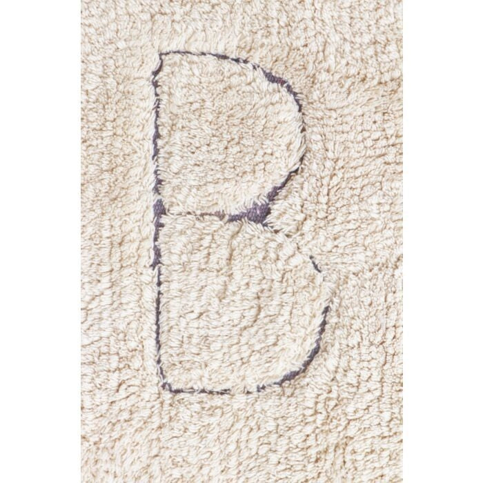 natural ABC area rug black tan playroom