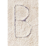 natural ABC area rug black tan playroom