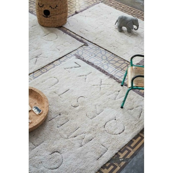 natural ABC area rug black tan playroom