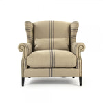 chair arms upholstered natural linen blue stripe lumbar pillow nailheads wingback wood feet