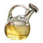 recycled green glass tilted white wine decanter ice pocket