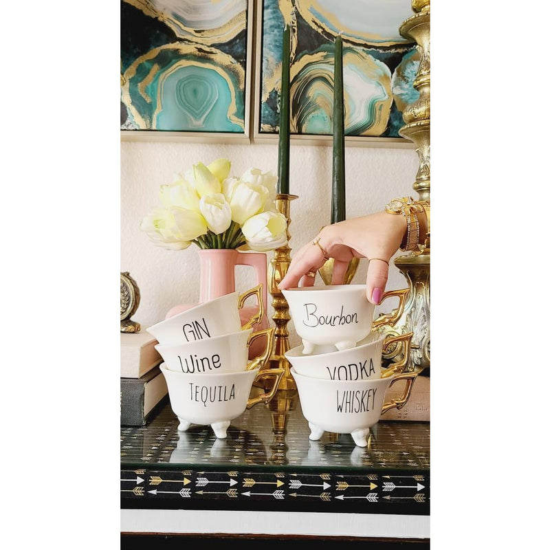 6 white footed tea cups gold handles tequila gin wine bourbon vodka whiskey