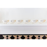 6 white footed tea cups gold handles tequila gin wine bourbon vodka whiskey