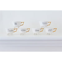 6 white footed tea cups gold handles tequila gin wine bourbon vodka whiskey