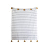 White and tan throw