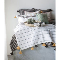 White and tan throw