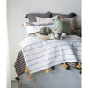 White and tan throw