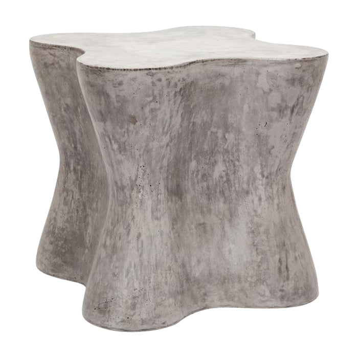 raw concrete tree trunk shaped side table