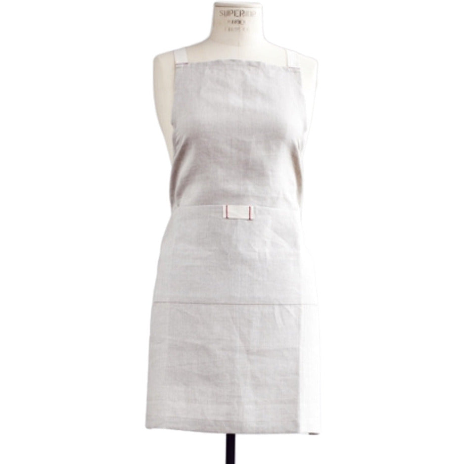 Natural oatmeal linen apron with pocket for casual entertaining.  Farmhouse style that is machine washable.