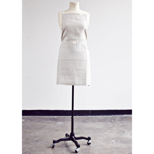 Natural oatmeal linen apron with pocket for casual entertaining.  Farmhouse style that is machine washable.