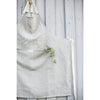 Natural oatmeal linen apron with pocket for casual entertaining.  Farmhouse style that is machine washable.