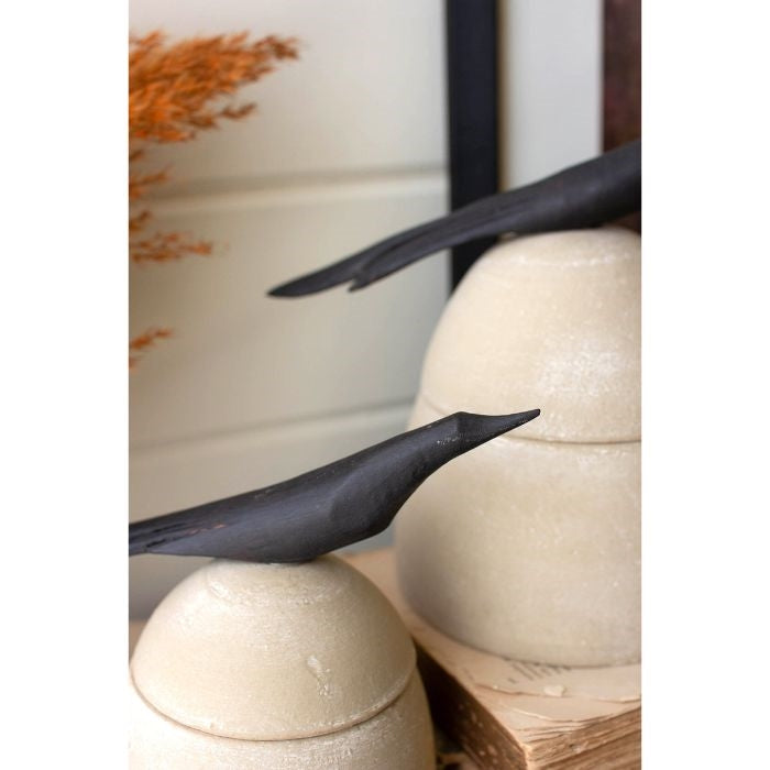 beige clay canister black bird handle 2