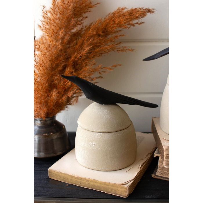 beige clay canister black bird handle 2