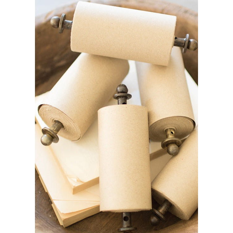 The Kalalou Table Top Wooden Note Roll Dispenser features five vintage-style 4" paper rolls with metal handles, neatly arranged on a wooden tray. Underneath, you'll find additional note rolls and extra paper sheets for your convenience.