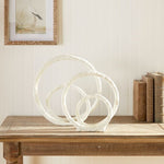 white sculpture set round modern cast aluminum