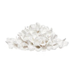 white oyster shell pile sculpture