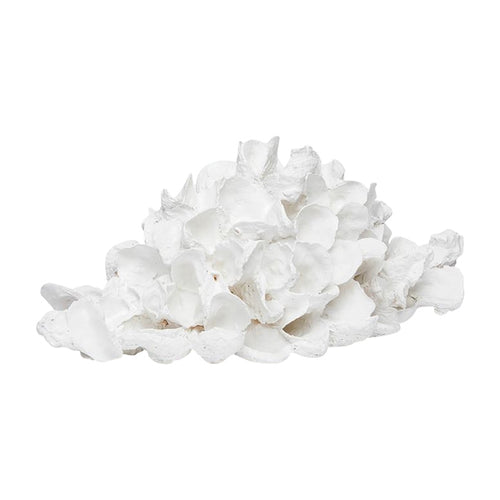 white oyster shell pile sculpture