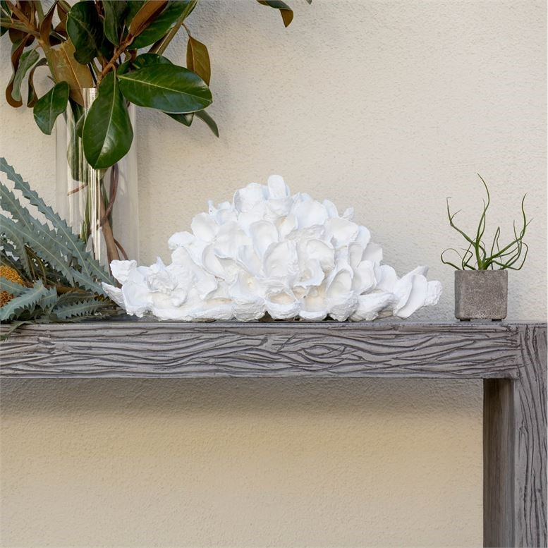 white oyster shell pile sculpture
