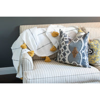 White and tan throw