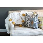 White and tan throw