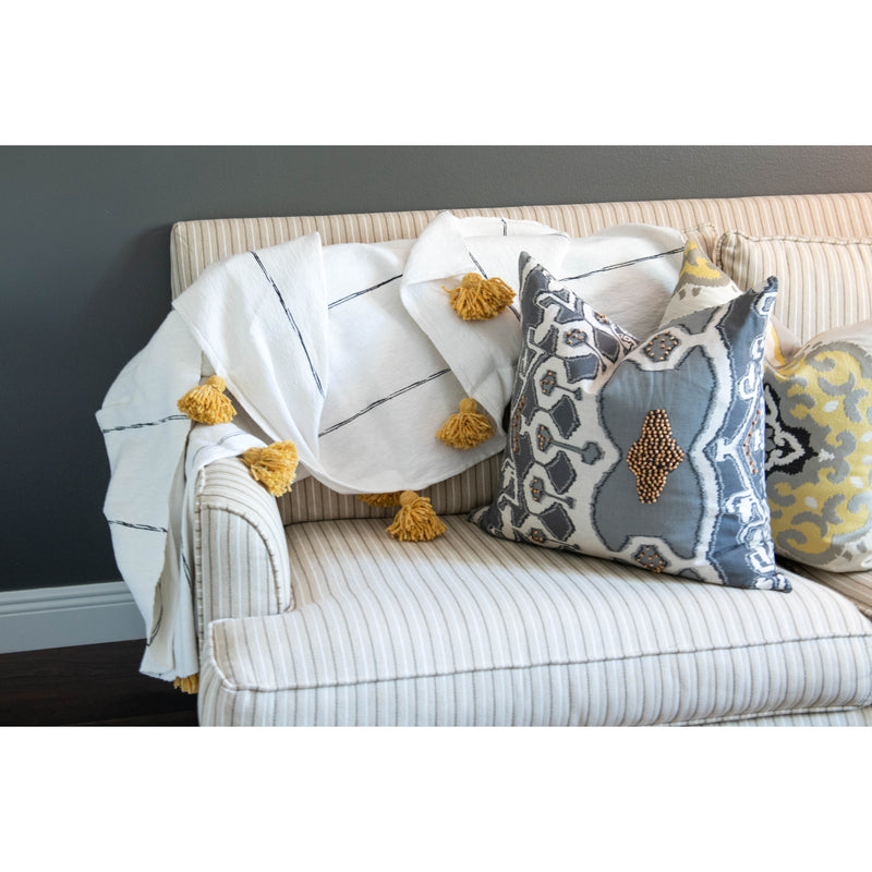 White and tan throw