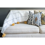 White and tan throw