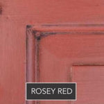 Close-up of a rosy red painted Regent Queen Caned Headboard by Phillips Scott, labeled "ROSEY RED" at the bottom.