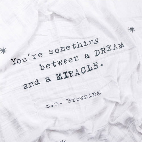 white baby blanket swaddle EB Browning quote dream miracle