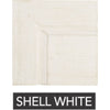 A wooden cabinet door with a shell white finish, shown with the text "SHELL WHITE" underneath. Perfect for pairing with the Phillips Scott Warren Square Coffee Table, which offers a dark stain finish or other custom finishing options.
