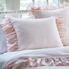 Pink and white ruffle bed set