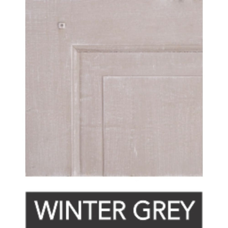 A close-up of the hand-finished surface in Winter Grey color features the text "WINTER GREY" below, showcasing the customizable design of the Phillips Scott Cavalier Round Dining Table - 72".