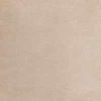 Surya's Cotton Velvet Beige Pouf features a light beige textured surface with a subtle gradient and soft appearance.