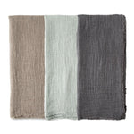 Grey mint and tan linen throws